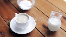 Hand Pouring Sugar By Teaspoon Into Coffee Cup 45 | Stock Footage