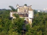 Kaiping Towers over Green Forest