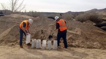 EZ Fill Sandbag Filler being used to fill sandbags by emergency workers