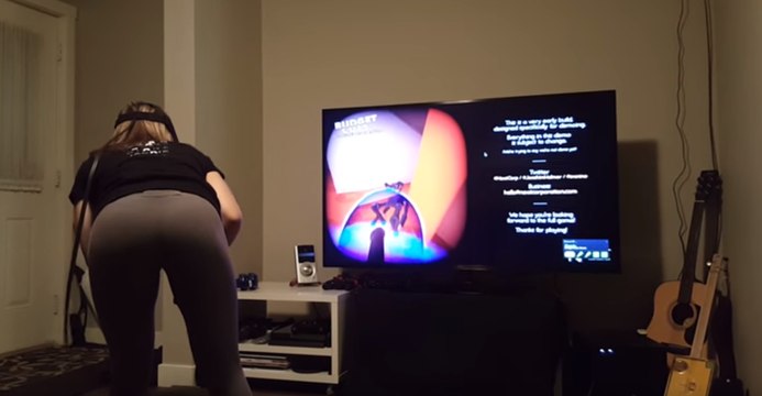 Husband Films Wife Playing Virtual Reality