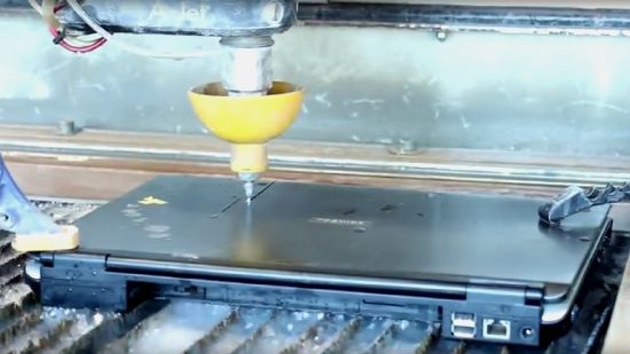 This Waterjet Is So Strong It Can Cut A Laptop In Half