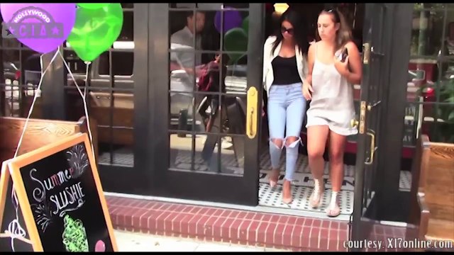 Selena Gomez Snatches a Fans Phone to take a Selfie & Shocks the Fan