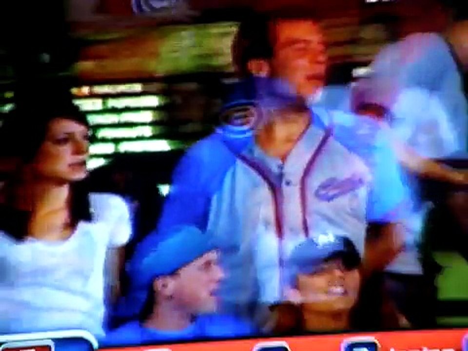 Drew Barrymore singing "Take me out to the ball game".   Sorry no sound Wrigley Field