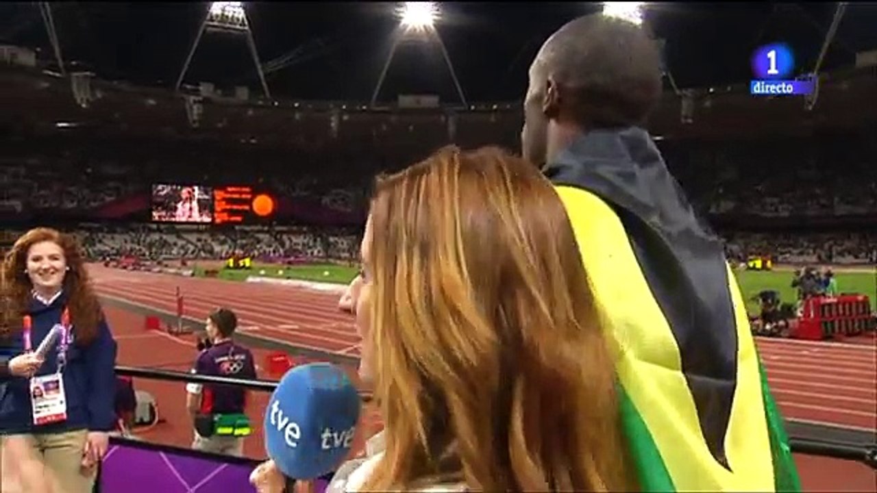 Usain Bolt stopped the interview to hear the U.S. anthem