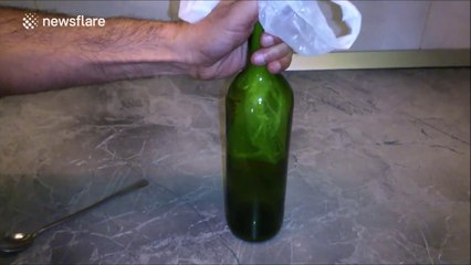 How to get a cork out of an empty wine bottle with a sports bag