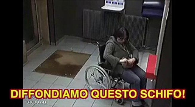 Ladro ruba borsa ad una donna in carrozzina, che schifo!