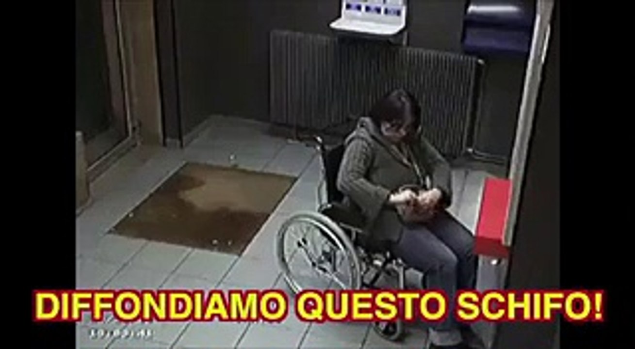 Ladro ruba borsa ad una donna in carrozzina, che schifo!