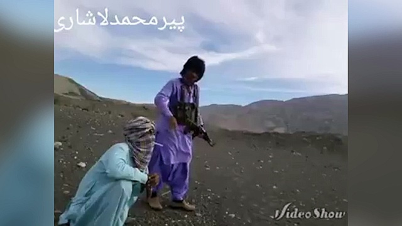 William Tell with an AK47: Pakistani daredevils play with fire