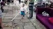 Little Chinese Boy with metal pipe Fights with Police VIRALVIDEO Adorable angry toddler defends grandma