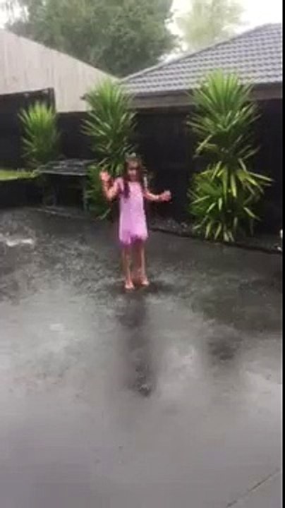 Stevie playing in the rain