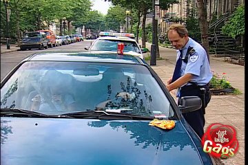 Policeman throwing food on car gag