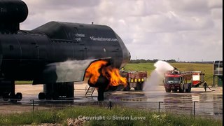Airport fire fighter training excercise. Manchester Airport UK