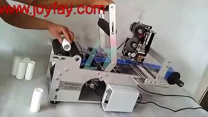 Máy dán nhãn decan chai tròn, máy dán nhãn chai siro,máy dán nhãn hủ yến,máy dán nhãn decan