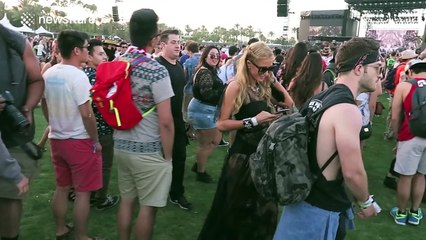 Paris Hilton attracts a lot of attention at Coachella