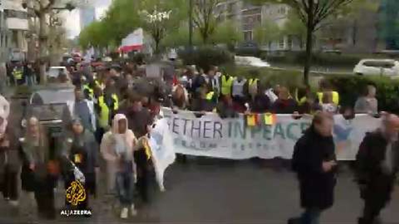 Belgians commemorate attack victims