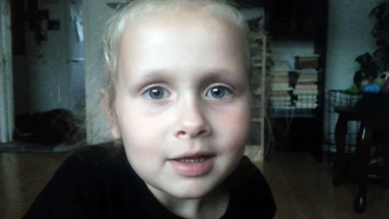 Little girl singing Five Little Speckled Frogs