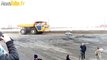 Car gets crushed by 450 ton truck