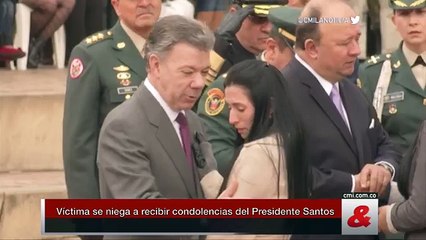 Mujer rechazó abrazo del presidente Santos
