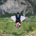 Wingsuit Base Jumping in Switzerland Through Waterfall