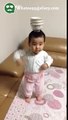 whatsapp funny videos cute baby dancing while balancing cup on head