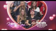 HILARIOUS Girl munches on pizza while on Kiss Cam