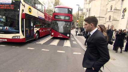 Ched Evans leaves court after winning appeal