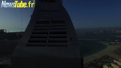 Daredevil Slides down Skyscraper