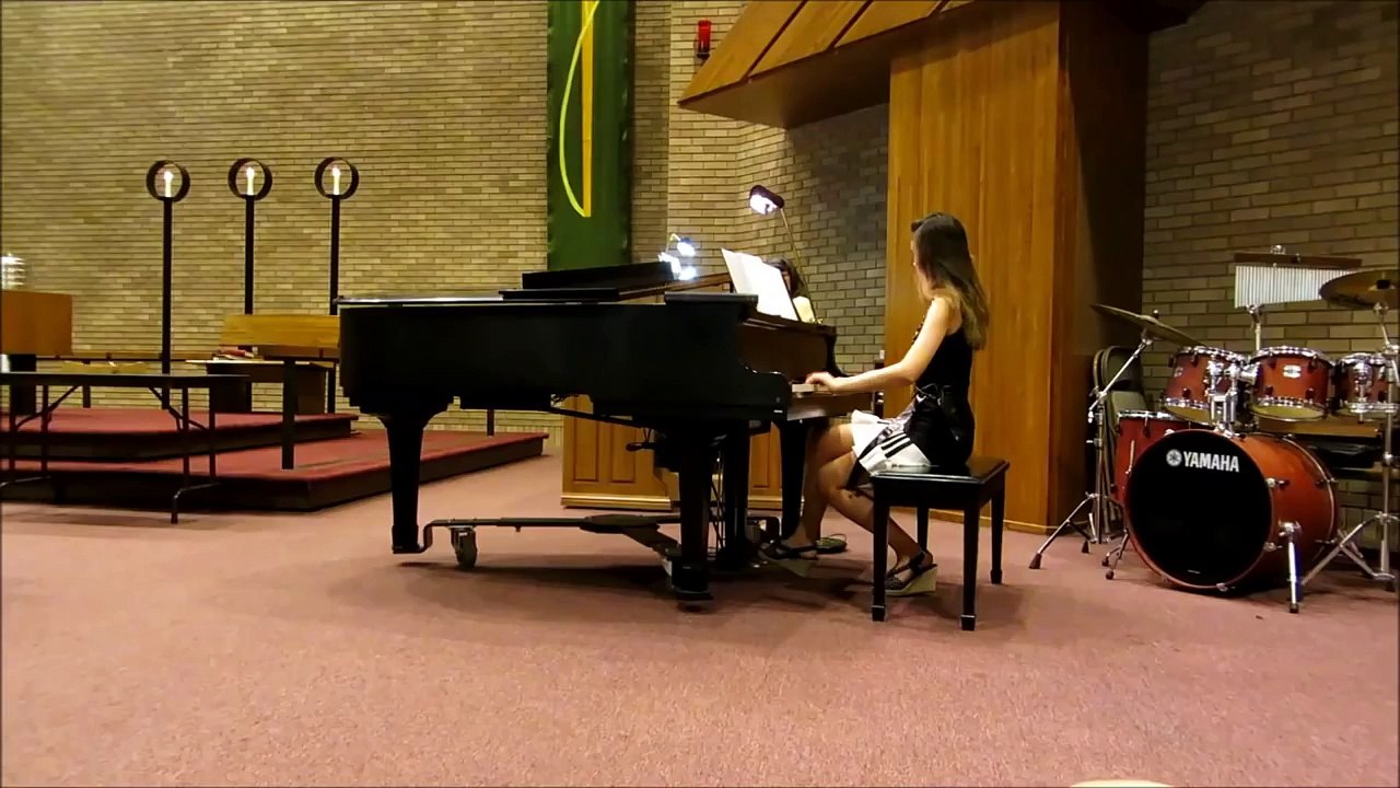 Tara playing piano in church Aug 14