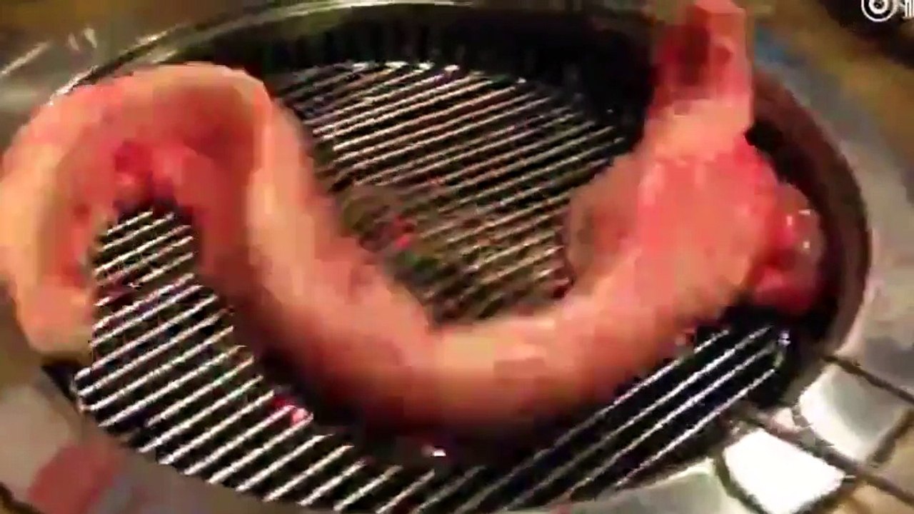 Creepy 'zombie' eel wriggles desperately on barbecue after being 'skinned alive'