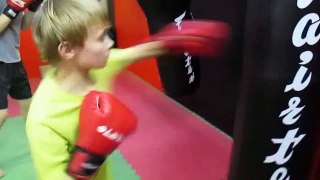 Anatoly and Alex working on boxing bag