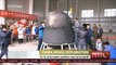 Chinas first retrievable microgravity satellite, the SJ-10, returns to Earth.