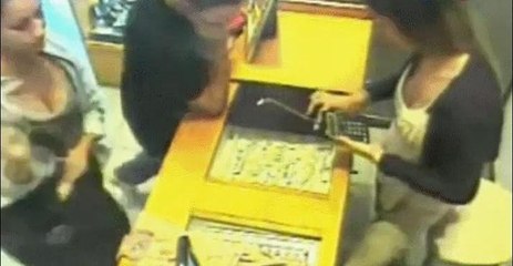 Woman Steals Jewelry (Most Blatant Theft Ever)