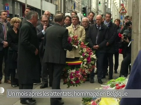 Un mois après les attentats, la Belgique entre enquêtes et recueillement