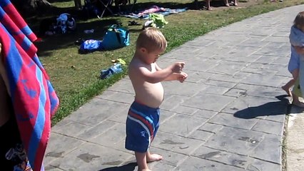 Playing in the Splash Pad at DS Group Picnic