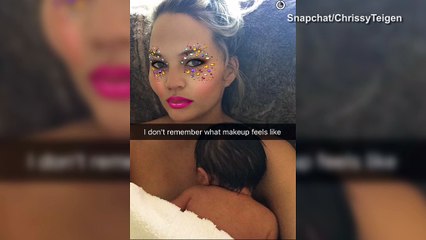 Chrissy Teigen takes snapchat selfies with newborn daughter Luna _ Daily Mail Online