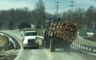 Logging Truck Flips Over Around a Corner