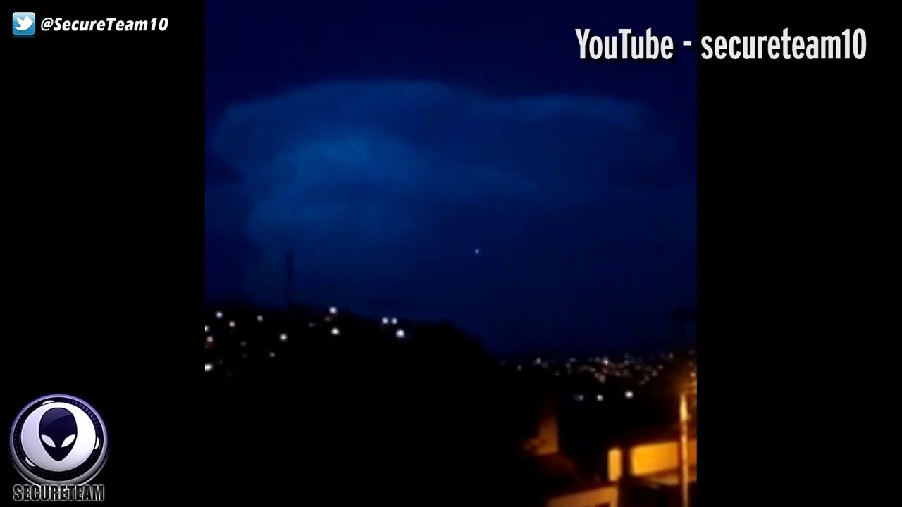 Shiny 'UFO' spotted observing giant lightning storm before disappearing inside cloud