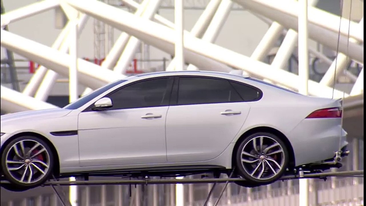 MOST DANGEROUS Car STUNT Jaguar XF Drives across river on 2 wires ( 480p )