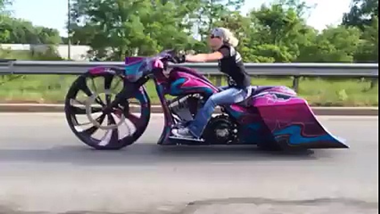 Bike Addiction - Chick riding a Crazy 32 inch big wheel bagger!