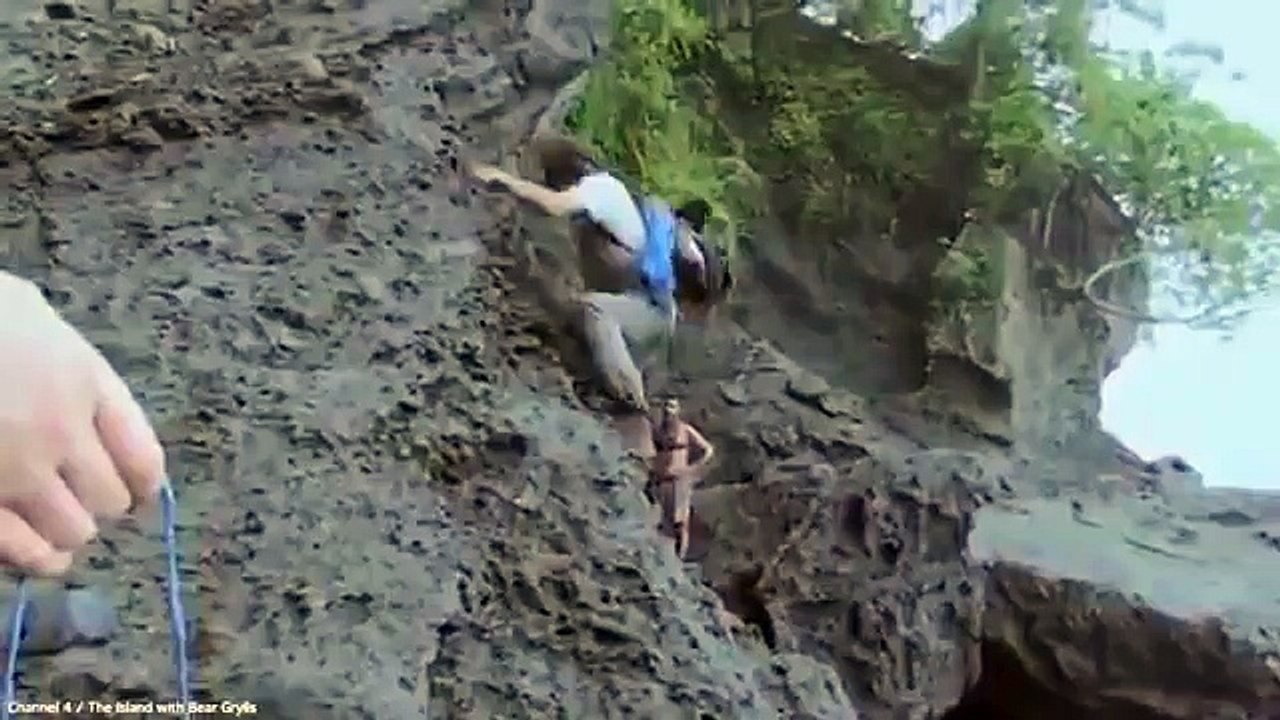 Man drops off coastal cliff face in Bear Grylls' The Island