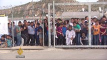 Merkel visits Turkish-Syrian border to bolster refugee deal