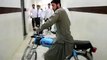 A Afghani Riding His Motorbike in The Corridors of Civil Hospital Quetta