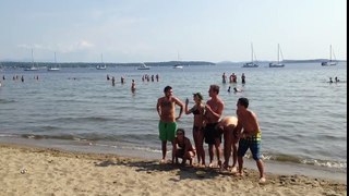 People are Awesome  Frontflip over 6 people at the beach!