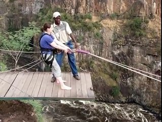 girl jump in the dangrous waves