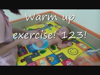 Triplets' first swimming lesson