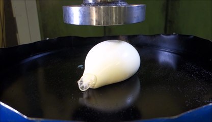 Crushing non-newtonian fluid with hydraulic press