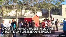 Un réfugié syrien pour porter la flamme olympique à dans un camp de migrants d'Athènes