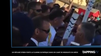 Un réfugié syrien porte la flamme olympique dans un camp de migrants grec (vidéo)
