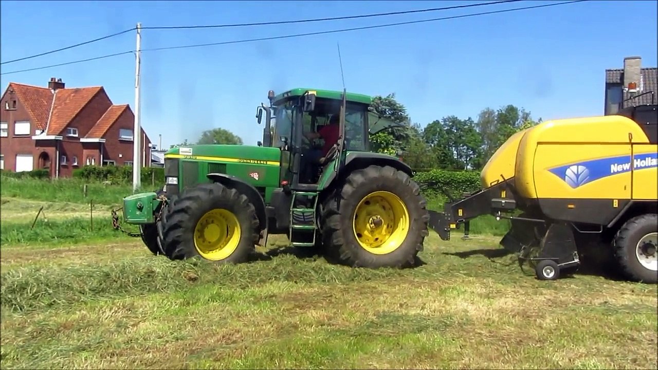John Deere 7810 met New Holland BB 9060