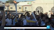 A flame of Hope: Syrian refugee carries Olympic flame through Greek migrant camp